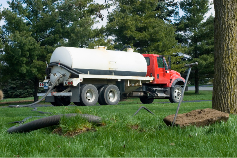 Image of a septic truck at work.